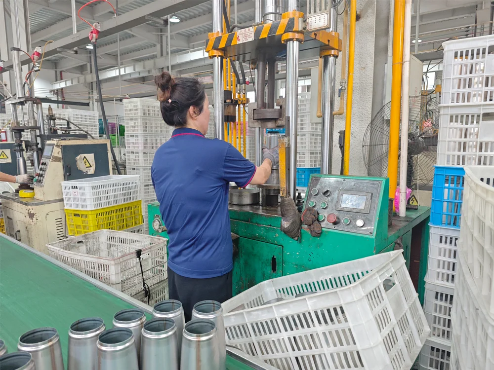 Operator running a machine with the part in hand