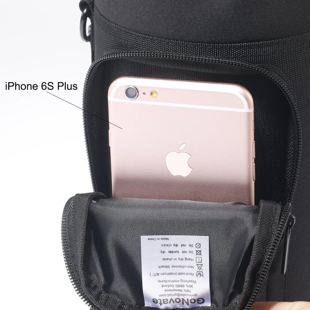 Phone in the zip pocket of a black bottle sleeve pouch